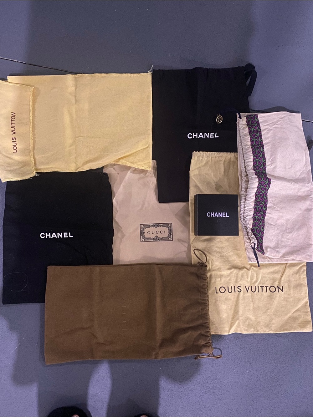 CHANEL Dust Bag Assortment in Black, Beige, Brown and Yellow
